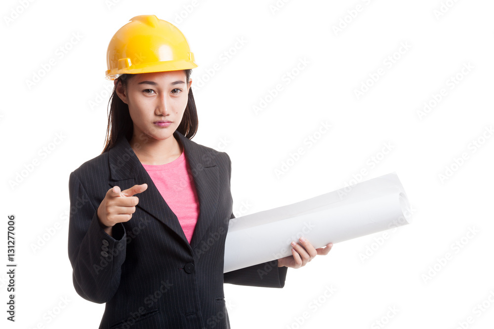 Asian engineer woman pointing with blueprints. Asian engineer woman pointing with blueprints.