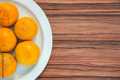fresh orange on wood table