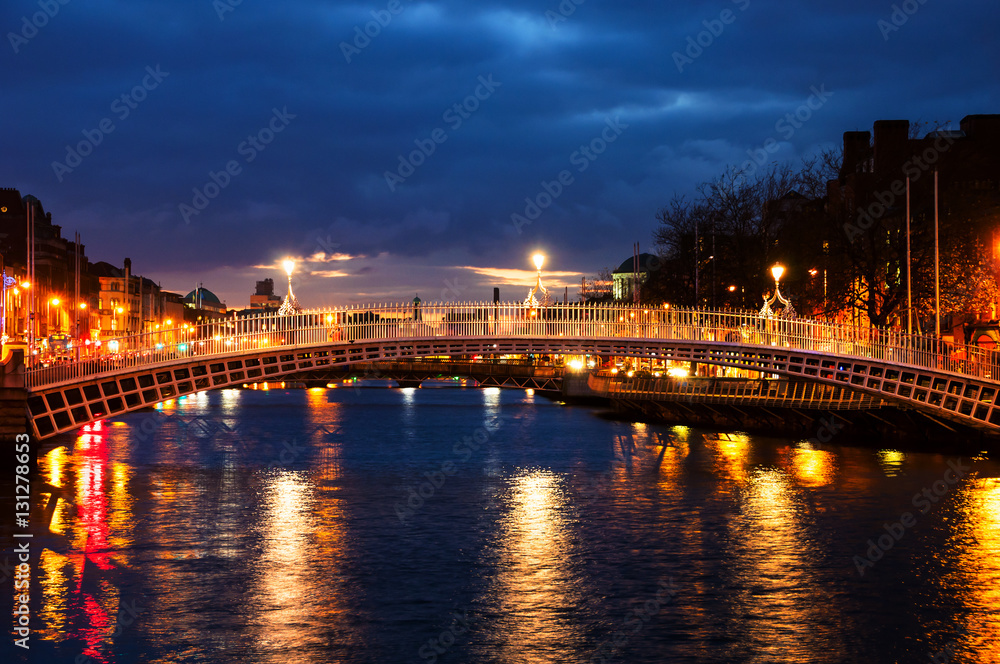 Dublin, Ireland. Night view of famous Ha Penny bridge