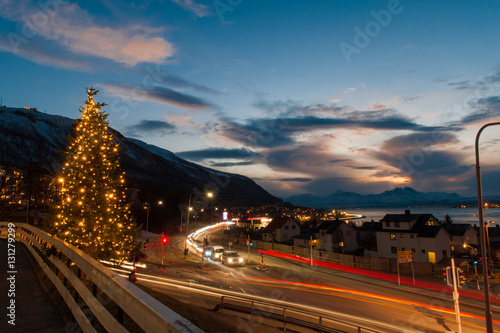 Night view of Tromso Bridge with lights in the city of Tromso in Norway