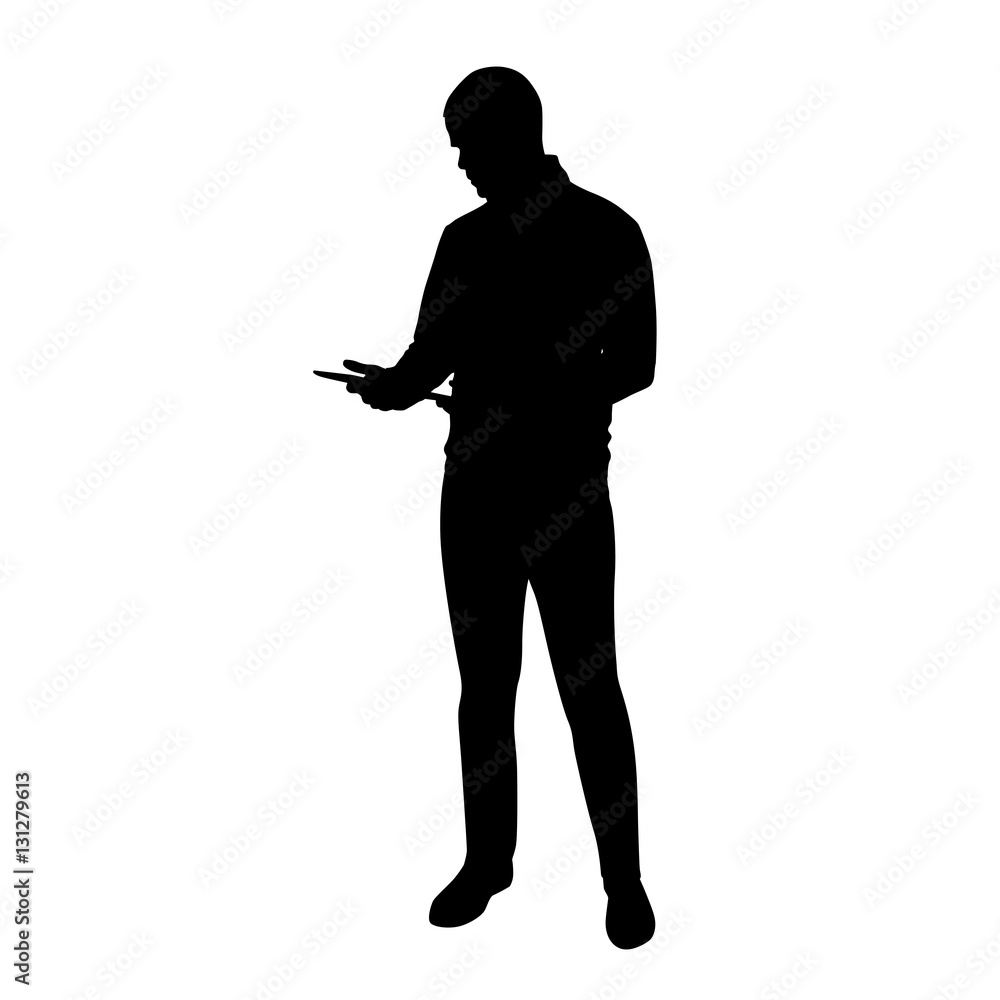 Young tall man standing and holding tablet in his hands, vector