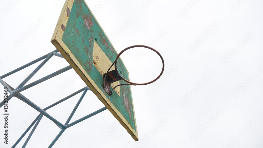 old basketball hoop outdoors rusty iron sport ball enters the basket old basketball hoop outdoors rusty iron sport ball enters the basket