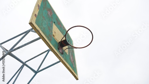 old basketball hoop outdoors rusty iron sport ball enters the basket