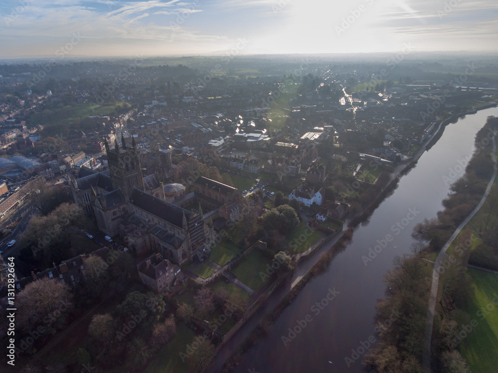 Aerial view of Worcester Cathedral in bright sunshine.