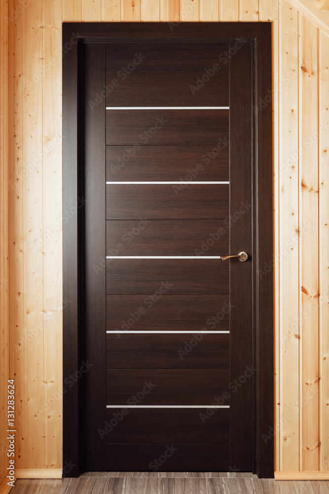 brown wooden door inside of wooden house brown wooden door inside of wooden house