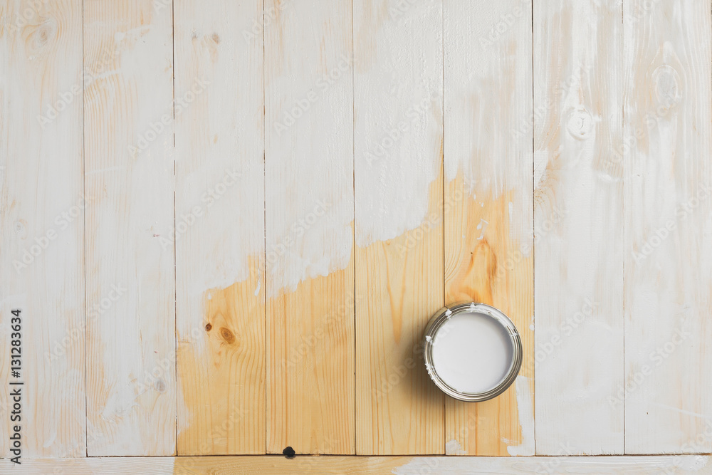 open cans of paint on a wooden painted background. open cans of paint on a wooden painted background.