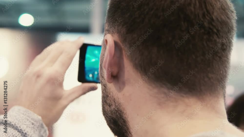 Close-up bearded attractive man uses virtual reality glasses Close-up bearded attractive man uses virtual reality glasses