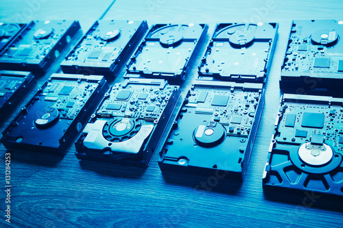 hard disk drives in a rows, blue tone