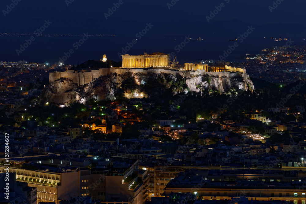 Athens Greece, night view of Partehnon temple on Acropolis hill