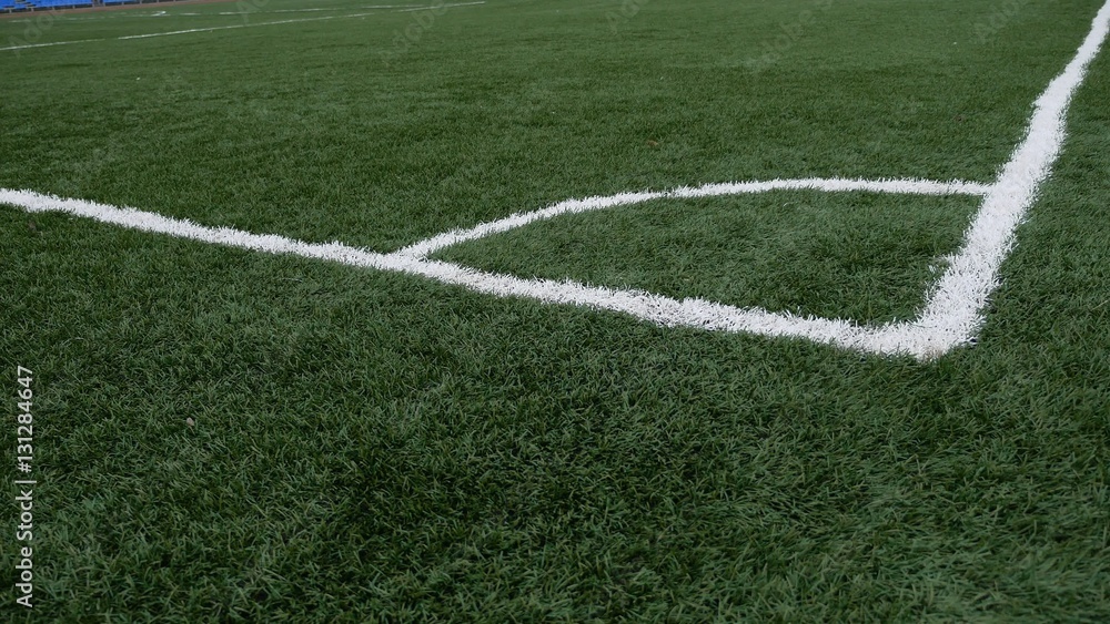 football Soccer field corner with green artificial sport grass