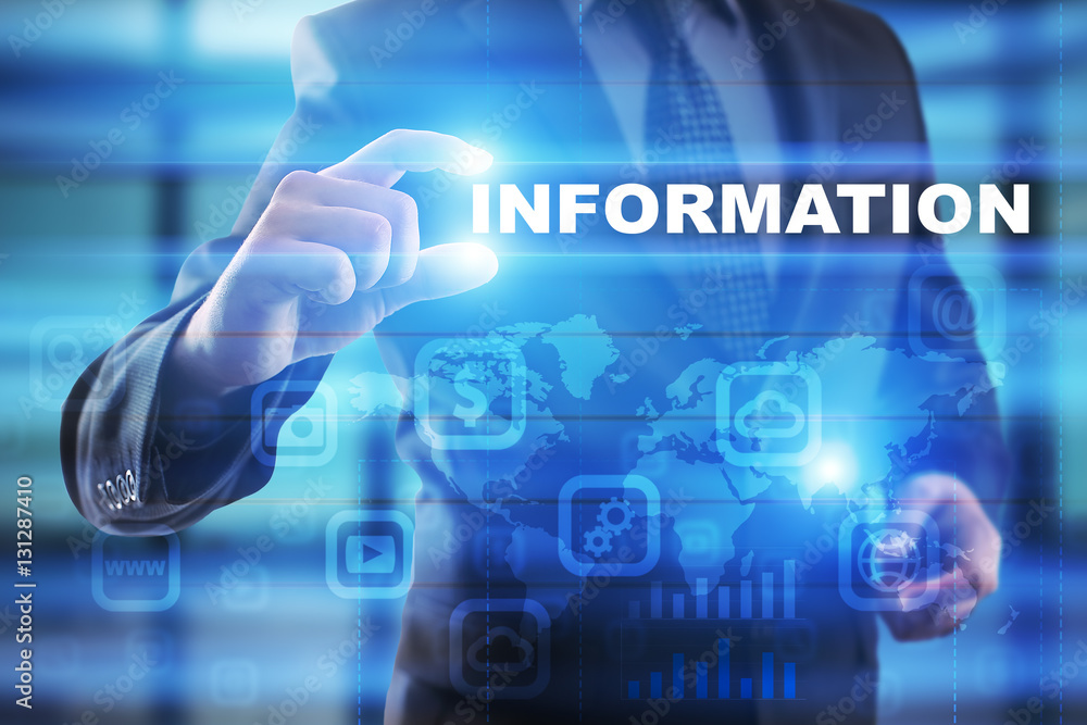 Businessman selecting information on virtual screen. Businessman selecting information on virtual screen.