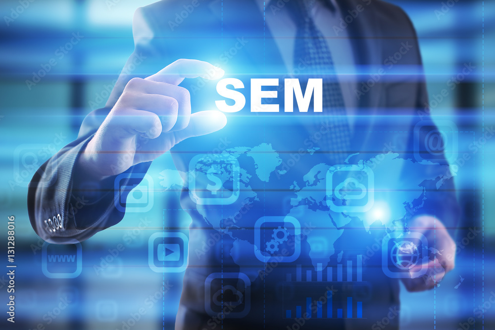 Businessman selecting sem on virtual screen. Businessman selecting sem on virtual screen.