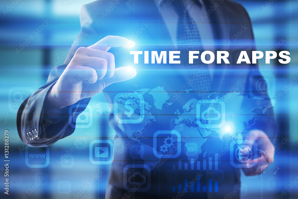 Businessman selecting time for apps on virtual screen. Businessman selecting time for apps on virtual screen.