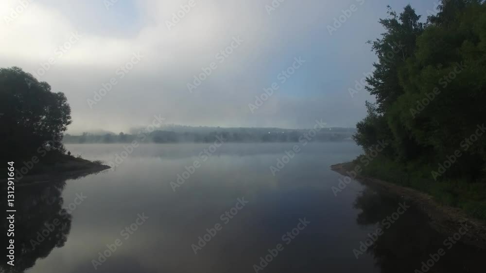 Fog on the river. Aerial view at river in morning time. Fog on the river. Aerial view at river in morning time.