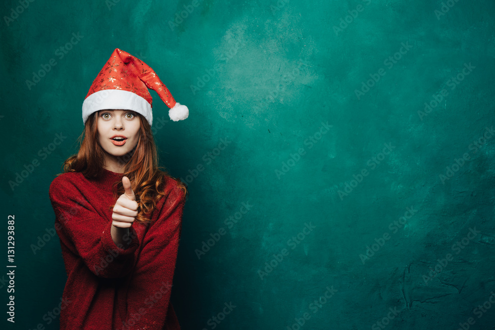 girl in a Christmas cap girl in a Christmas cap