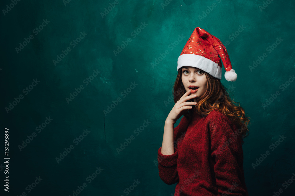 girl in a Christmas cap girl in a Christmas cap