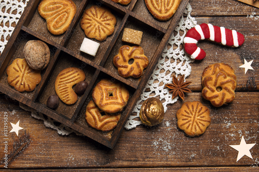New Year's day breakfast tea with nuts and sugar cane on wooden background New Year's day breakfast tea with nuts and sugar cane on wooden background