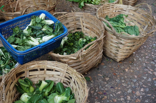 Basket of green bok choi vegetables at an Asian market