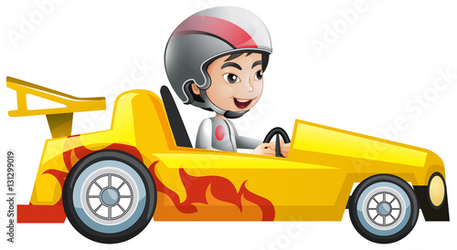 Boy in yellow racing car