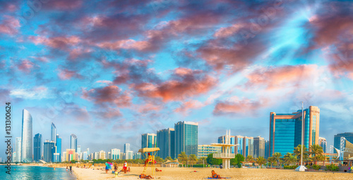 Abu Dhabi city view at sunset from Corniche Beach, UAE