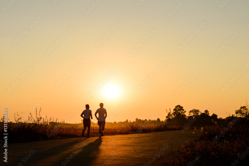 silhouette of two old man jogging for exercise