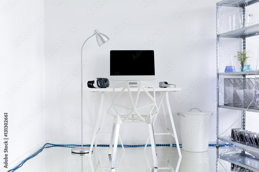 Trendy white home office area Trendy white home office area