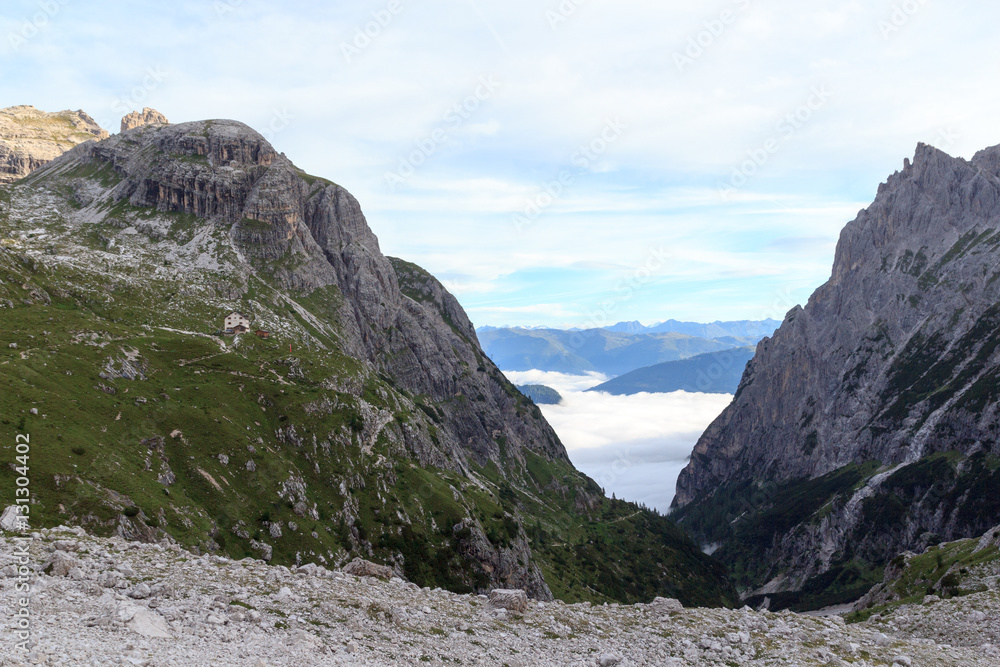 Valley Fischleintal, alpine Hut Zsigmondyhütte and mountains in Sexten Dolomites, South Tyrol, Italy