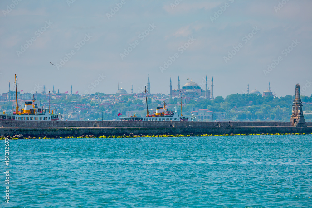 ferryboat with Sultanahmet mosque and hagia sophia in background