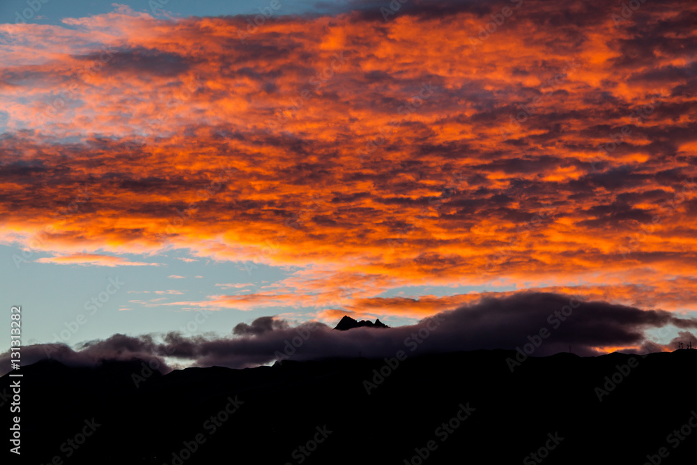Fototapeta premium Sunset with orange clouds