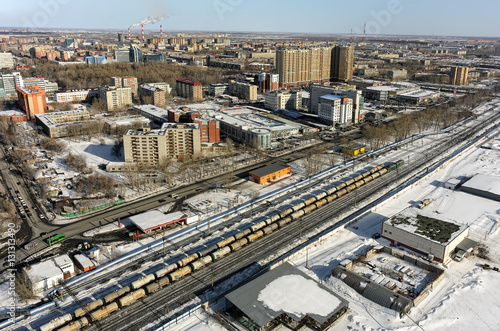 Tyumen, Russia - March 11, 2016: The railroad along 50 let VLKSM Street, dividing residential and industrial districts of city