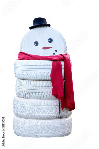 Snowman made from painted tires isolated on white background.