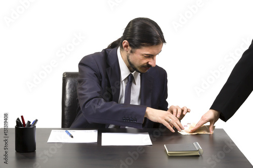 Businessman accepting a bribe in payoff