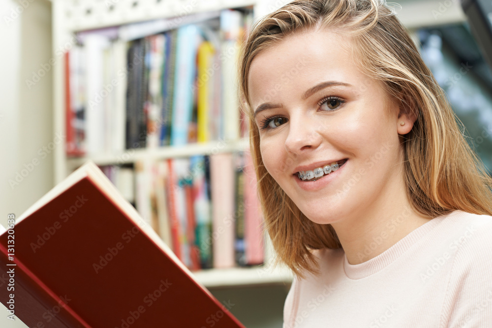 Teenage Girl Reading Book At Home Teenage Girl Reading Book At Home