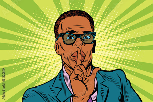 Businessman gesture Shh silence
