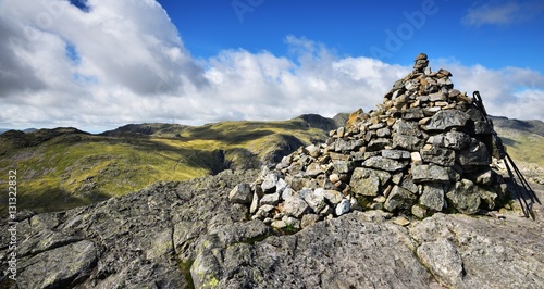 Cairn and walking poles © drewrawcliffe