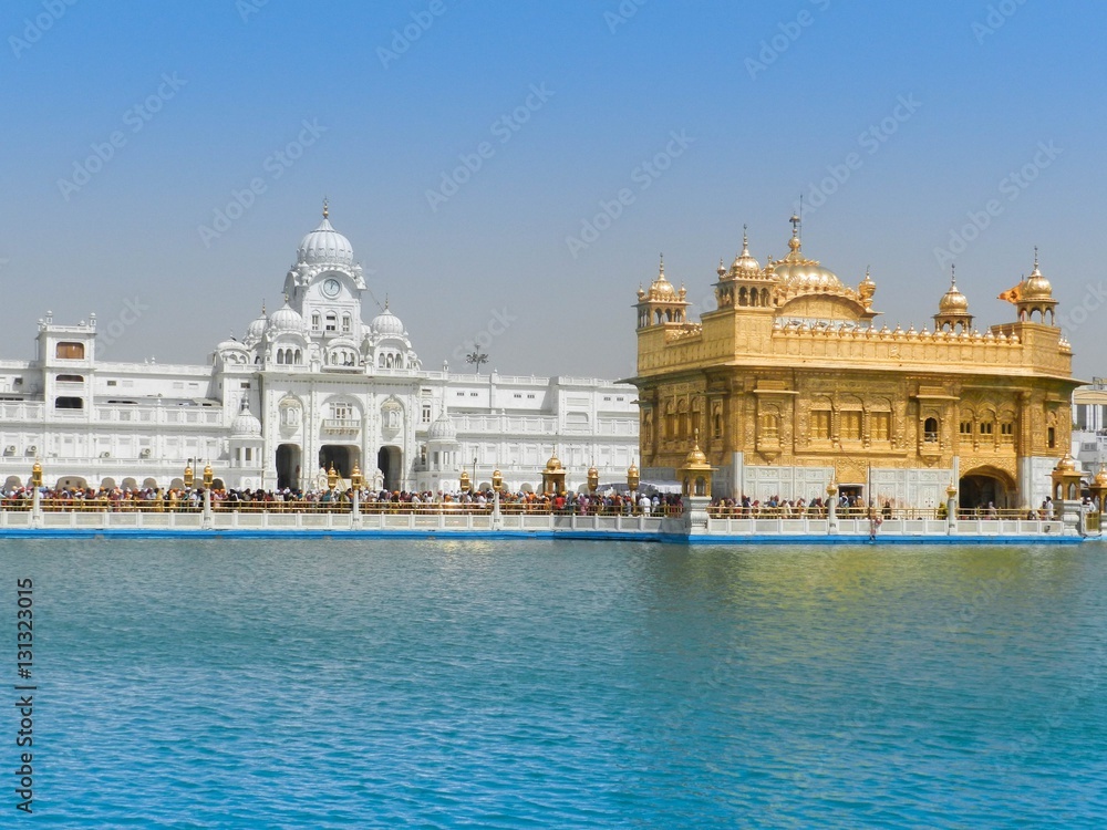 Beautiful golden temple with the lake in India