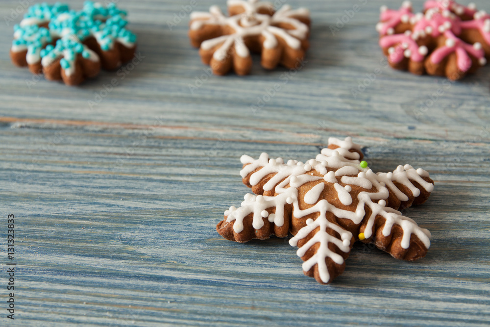 Christmas gingerbread on a wooden background Christmas gingerbread on a wooden background