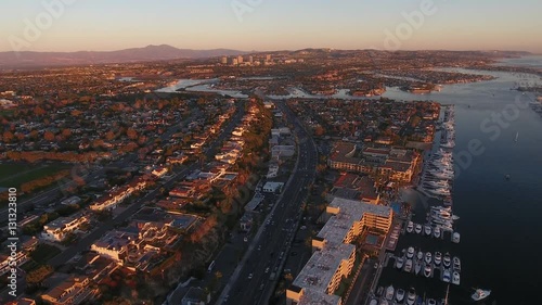 Newport Beach Aerial along the Mariners Mile section of Pacific Coast Highway looking toward the Newport Back Bay and Fashion Island