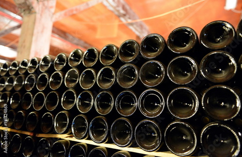 A bottle of wine in the cellar of the winery
