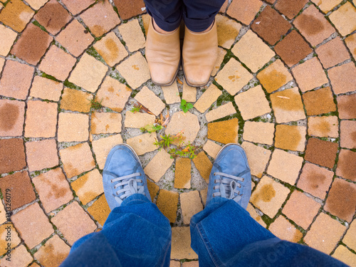 Feet on the pavement. © shahteer