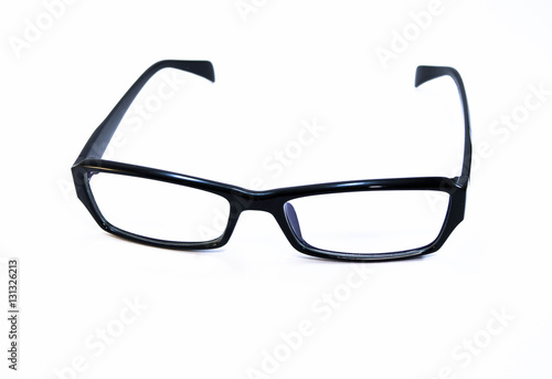 Fototapeta Naklejka Na Ścianę i Meble -  Glasses with a black rim. Business style glasses on a white back