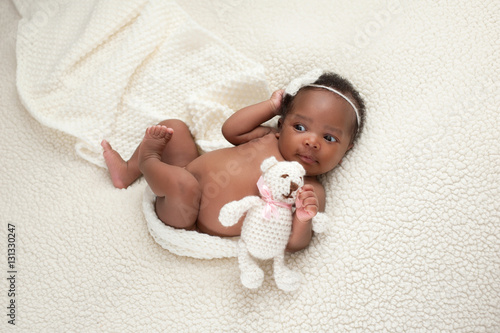 Newborn Baby Girl with Stuffed Bear