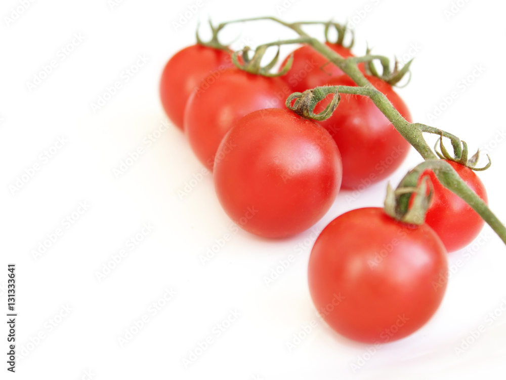 red tomatoes isolated on the white