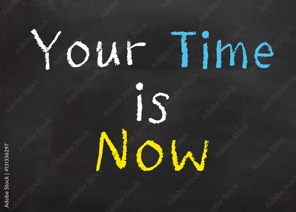 Fototapeta premium Motivational saying written on a black chalkboard