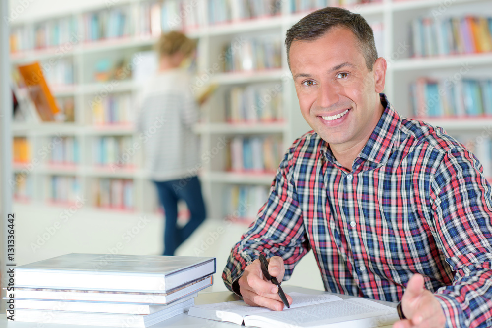 Portrait of man in library Portrait of man in library