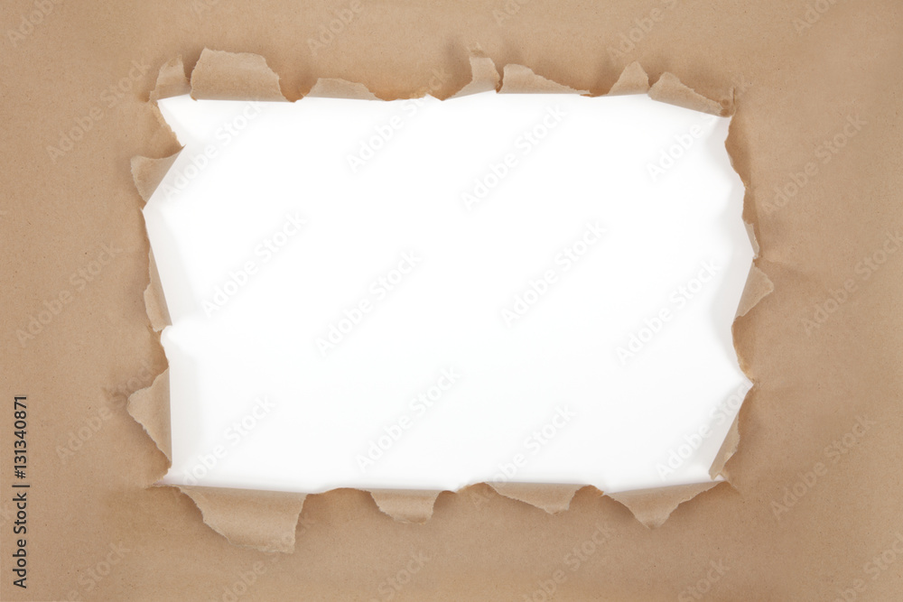 Fototapeta premium Torn thick brown paper frame. Clipping paths for interior and paper curls. Clip interior on layer set to multiply for shadow on pasted content.