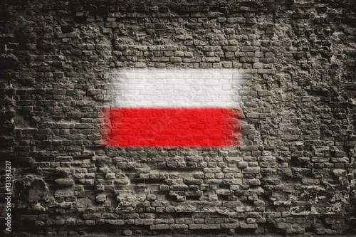 Polish flag on the old wall