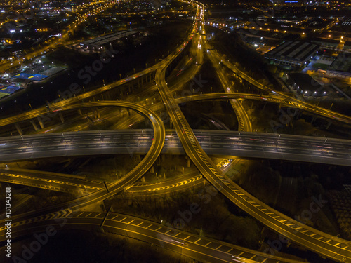 Aerial view of Spaghetti junction at night, UK. photo