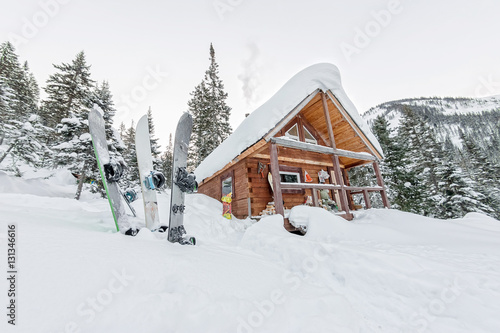 Snowboard at house chalets in winter forest with snow in mountai