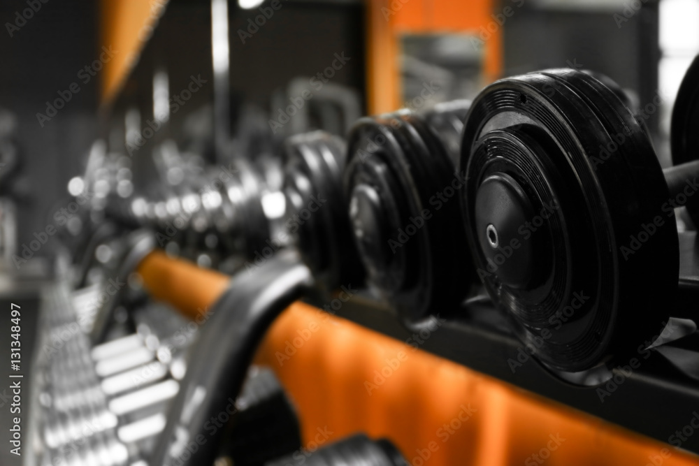 Closeup of dumbbells in gym Closeup of dumbbells in gym